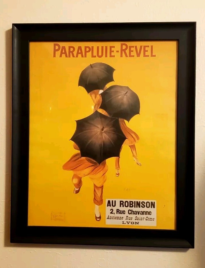 Leonetto Cappiello Classic ‘Parapluie Revel’ Framed Art – Yellow Large