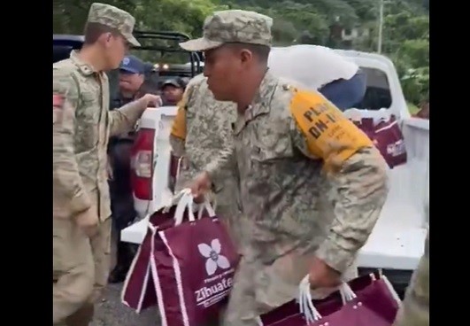 En Puebla, ayuda llega en bolsas color guinda